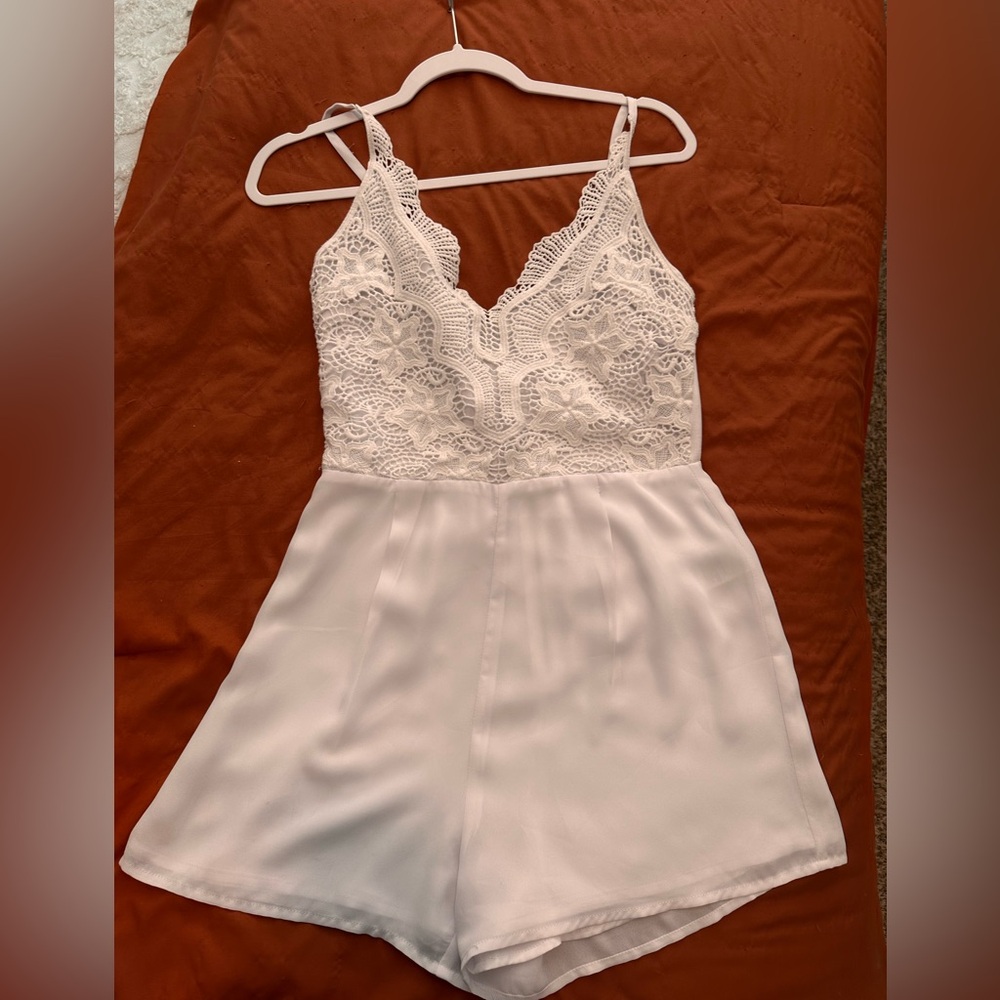 BEBE Elegant Lace Trimmed Women's Romper